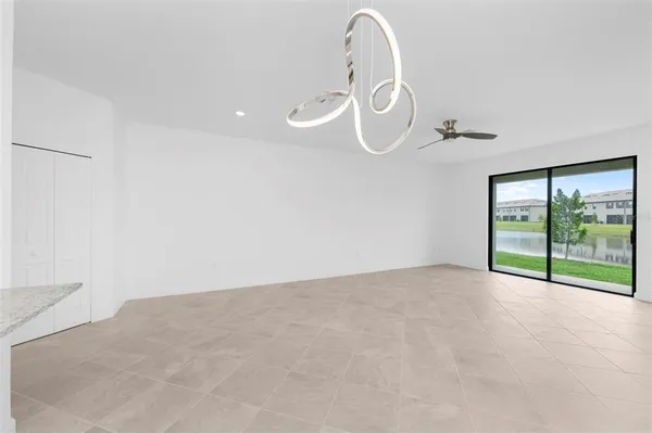 a view of a room with sliding glass door and mountain view