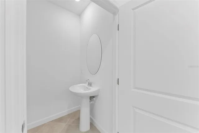 a close view of light fixtures and a sink