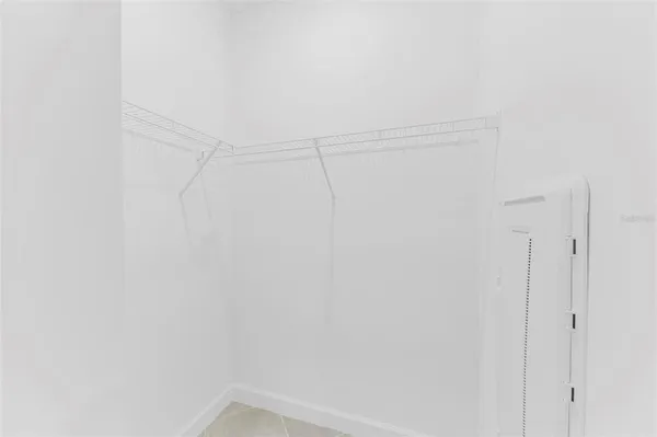 a view of a room with racks on the wall