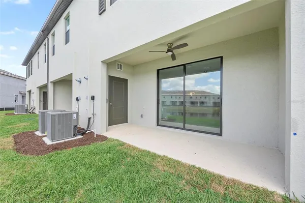 a view of a backyard with a garden and plants