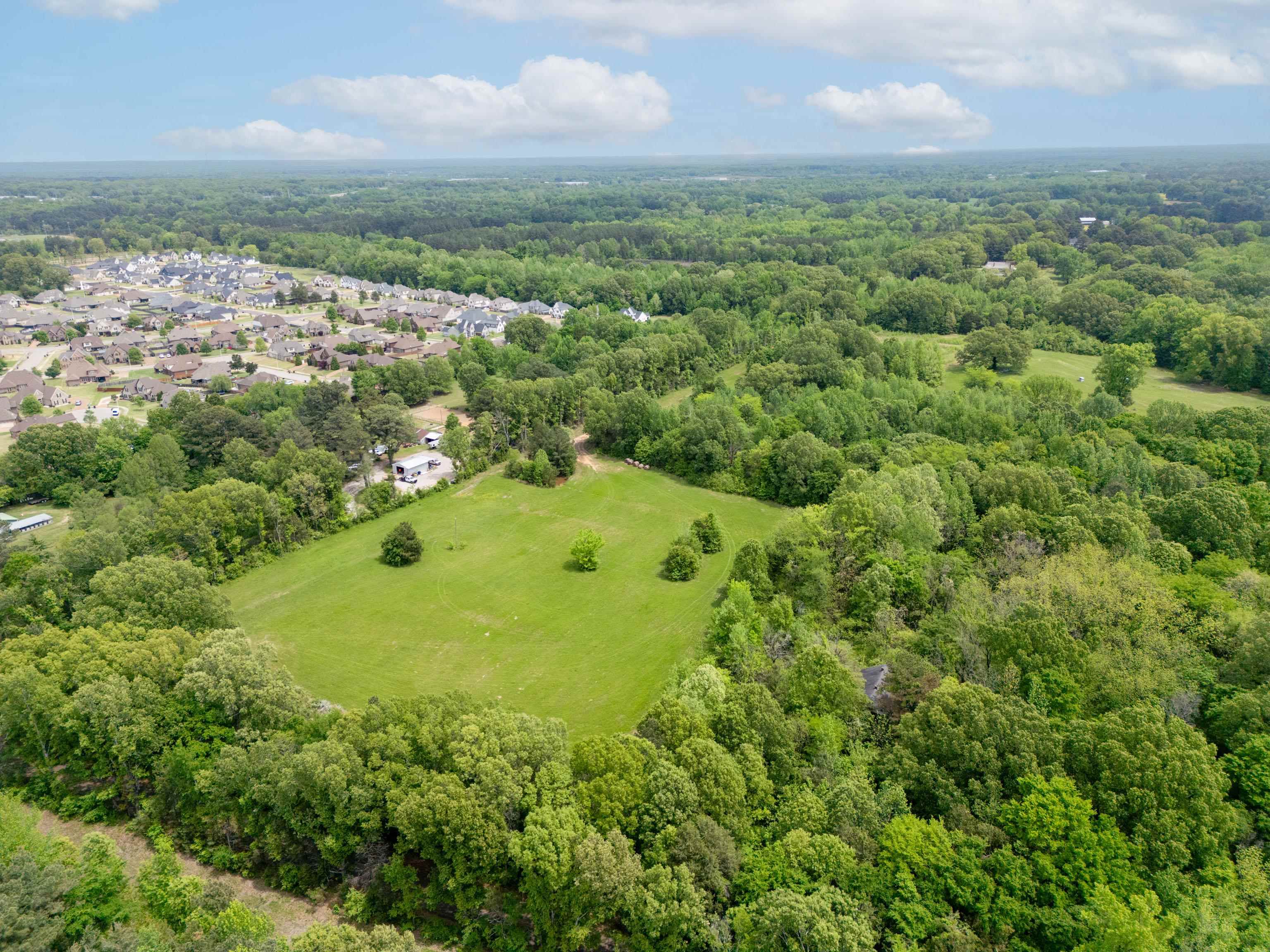 1492 Sycamore Road Collierville, TN 38017 - Photo 11 of 18 an aerial view of a residential houses with yard and lake view