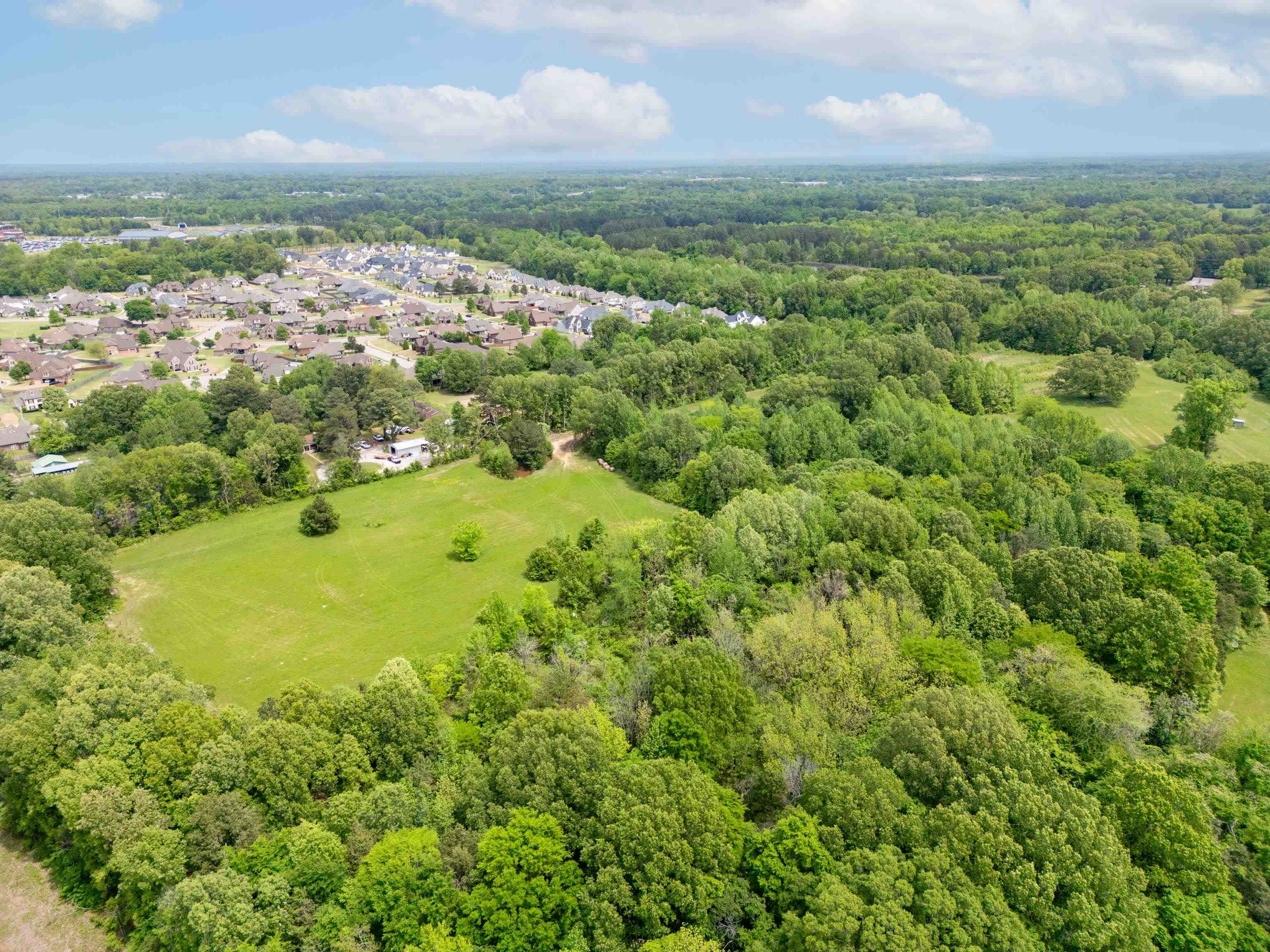 1492 Sycamore Road Collierville, TN 38017 - Photo 12 of 18 an aerial view of residential houses with outdoor space and trees