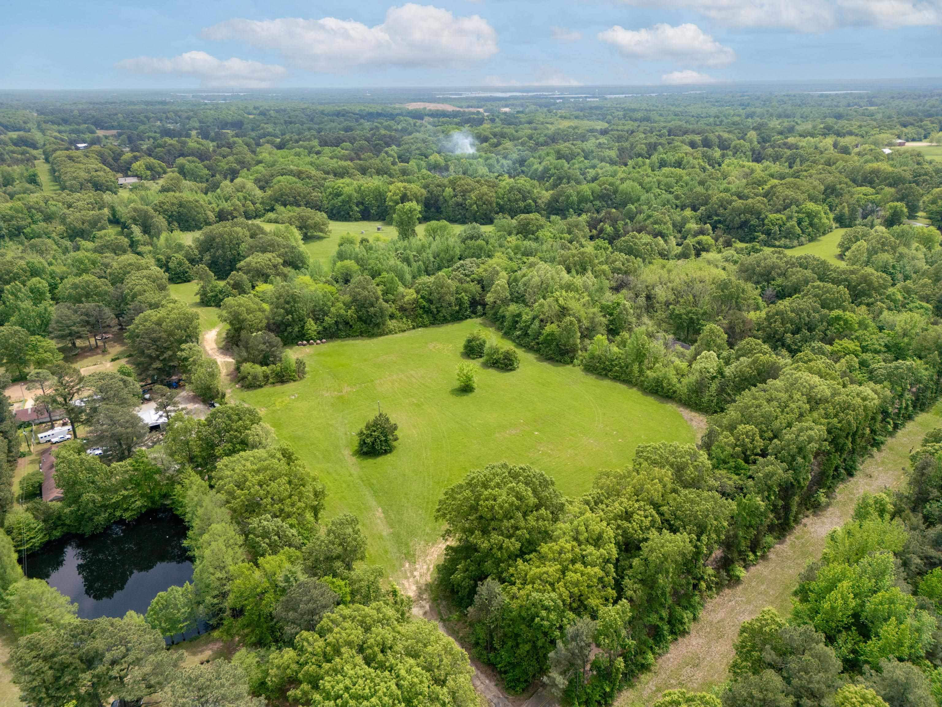 1492 Sycamore Road Collierville, TN 38017 - Photo 5 of 18 an aerial view of residential houses with outdoor space and trees