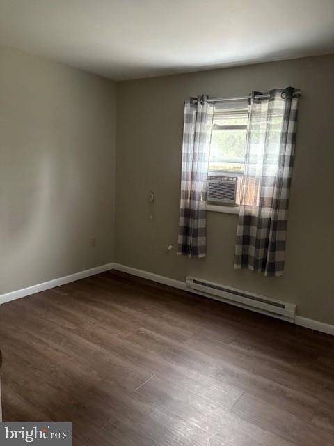 41 Bick Road, Unit 2 Fleetwood, PA 19522 - Photo 9 of 12 an empty room with wooden floor and door