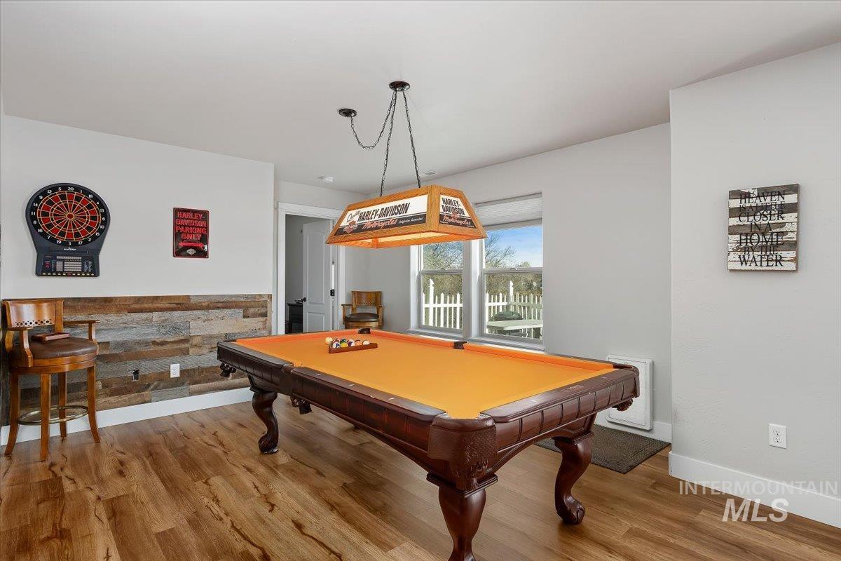 40 Bell Rapids Road Hagerman, ID 83332 - Photo 18 of 50 Playroom featuring billiards, wood finished floors, and heating unit