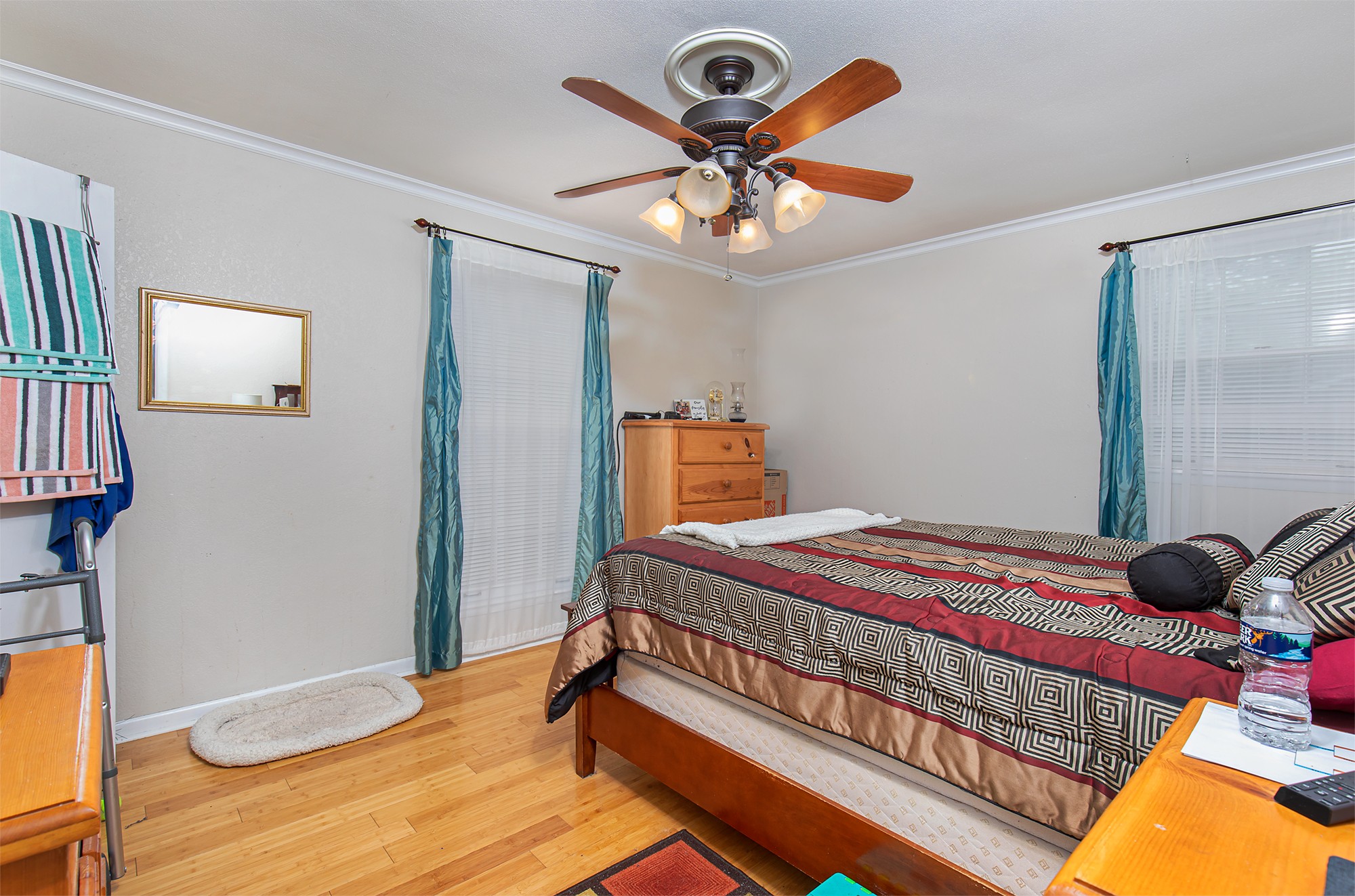 3114 Tyree Springs Road Hendersonville, TN 37075 - Photo 11 of 18 a bedroom with a bed and cabinets