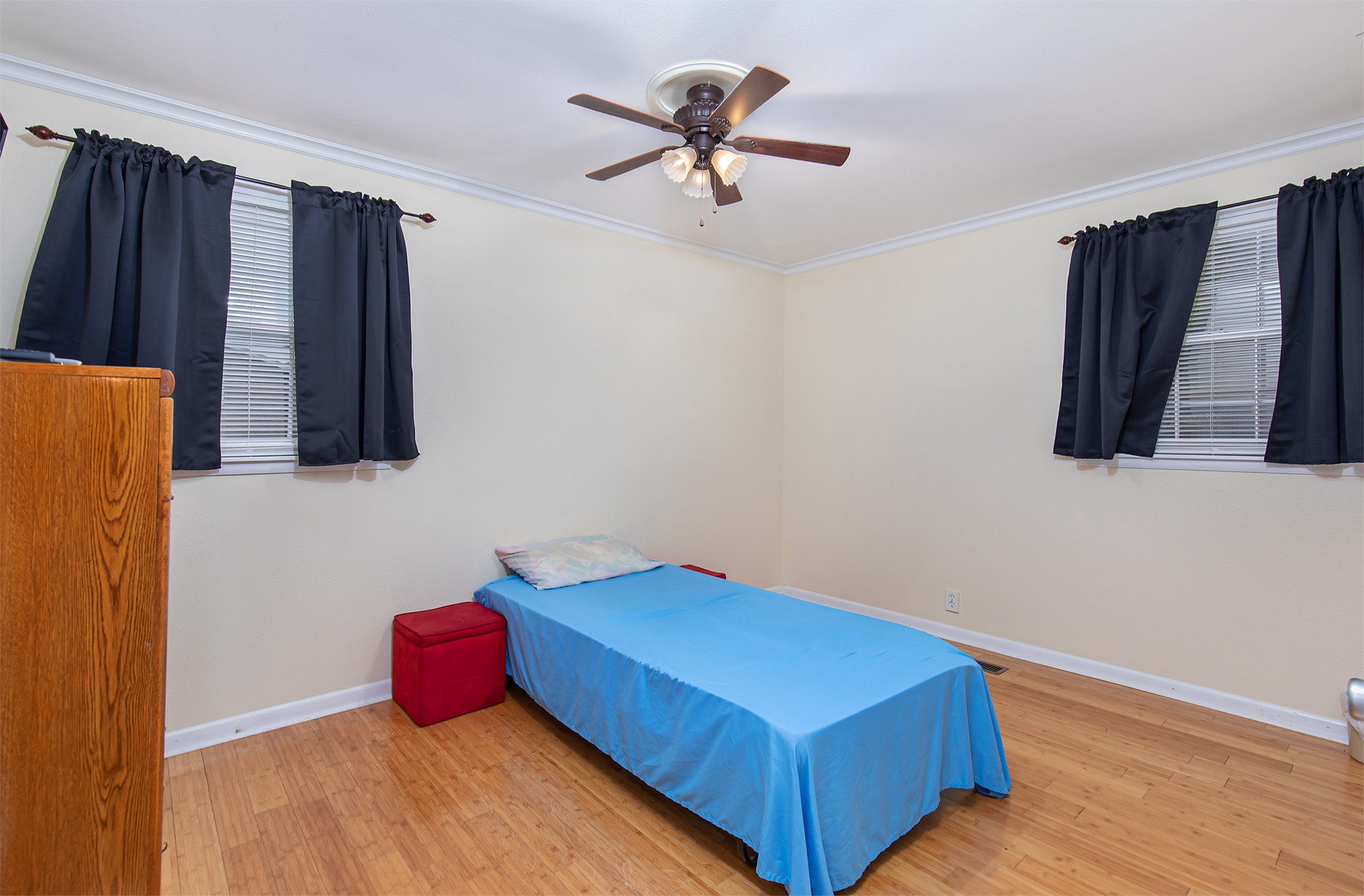 3114 Tyree Springs Road Hendersonville, TN 37075 - Photo 12 of 18 a room with a bed and a chandelier