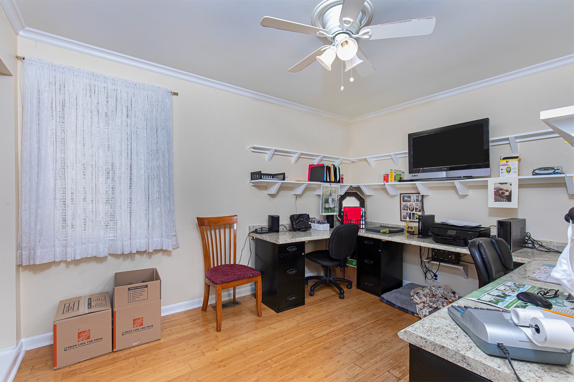 3114 Tyree Springs Road Hendersonville, TN 37075 - Photo 14 of 18 a view of a workspace with furniture and a flat screen tv
