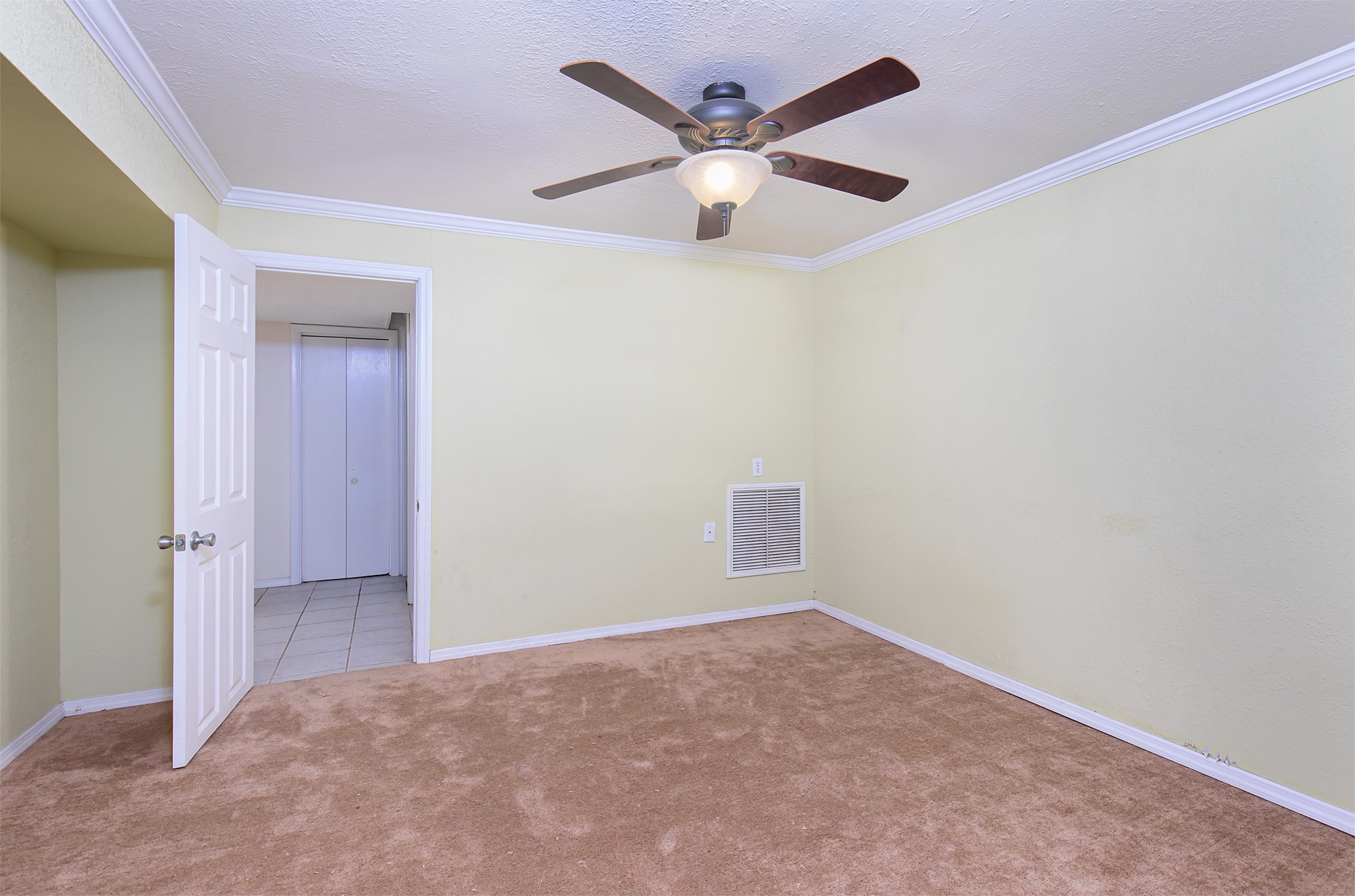 3114 Tyree Springs Road Hendersonville, TN 37075 - Photo 16 of 18 an empty room with a ceiling fan and a window