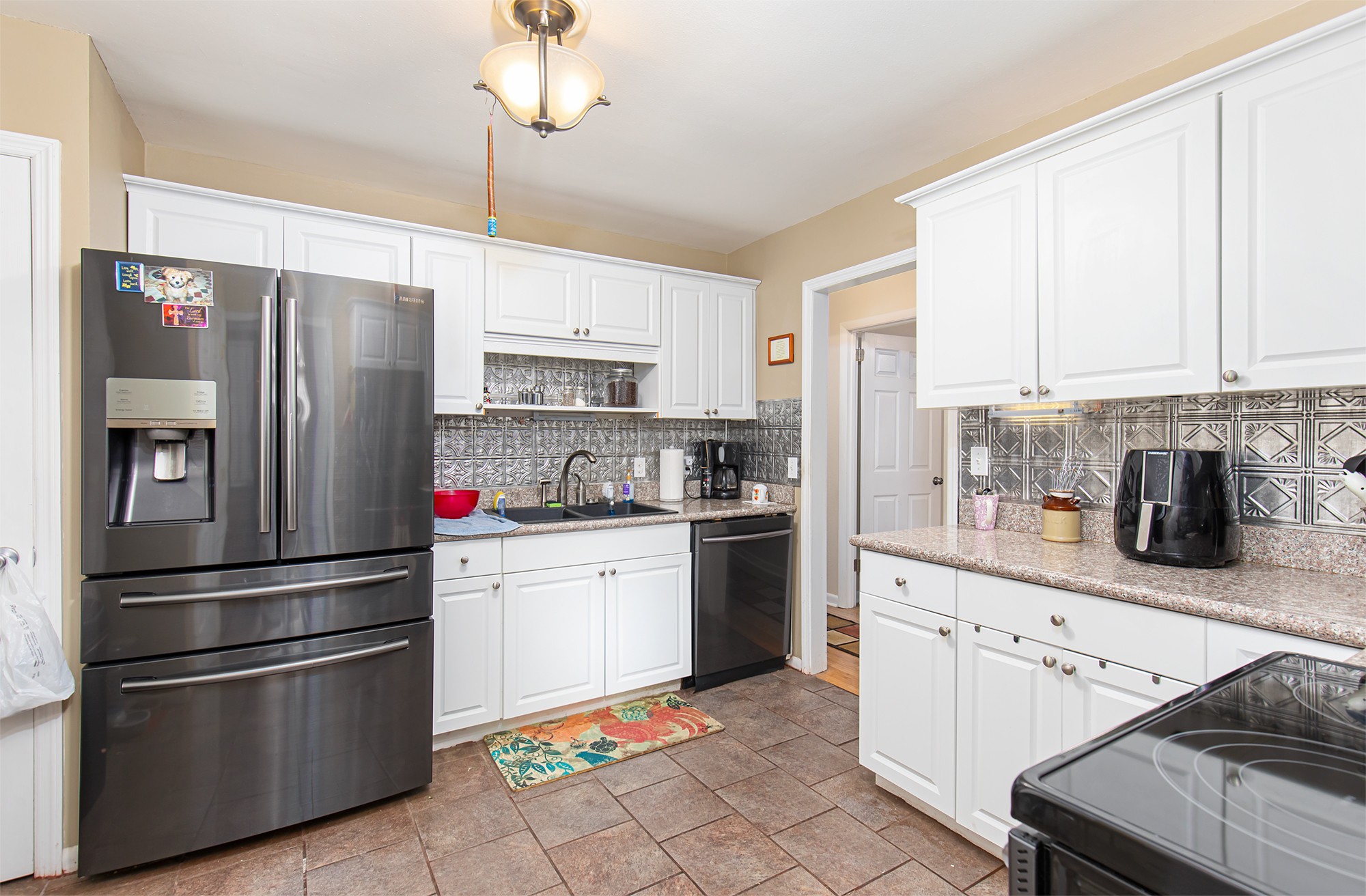 3114 Tyree Springs Road Hendersonville, TN 37075 - Photo 6 of 18 a kitchen with stainless steel appliances cabinets and a counter top space