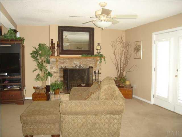 3960 McClellan Road Pensacola, FL 32503 - Photo 13 of 24 Fireplace in living room