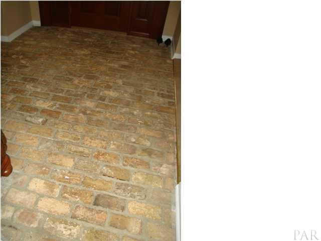 3960 McClellan Road Pensacola, FL 32503 - Photo 15 of 24 Brick flooring in foyer