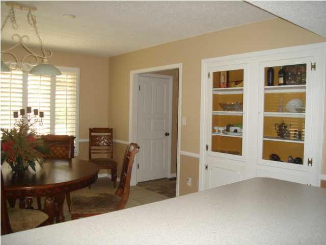 3960 McClellan Road Pensacola, FL 32503 - Photo 20 of 24 Built-ins in the corner of the dining room.