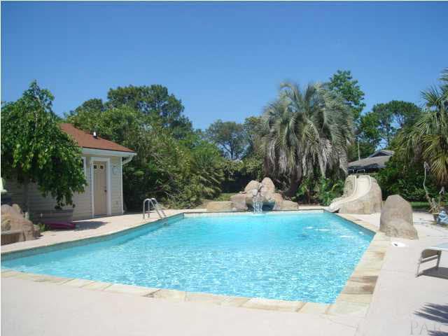 3960 McClellan Road Pensacola, FL 32503 - Photo 5 of 24 There is a half bath in the garage, outdoor shower area, slide and fountain