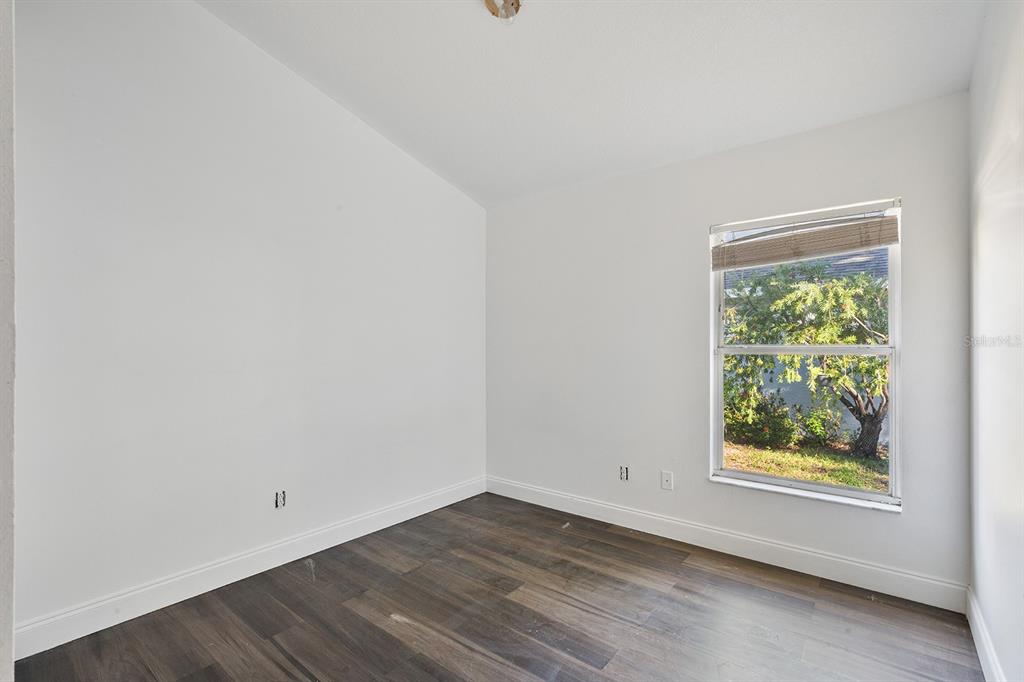 608 Bridge Creek Boulevard Ocoee, FL 34761 - Photo 11 of 17 a view of an empty room with a window