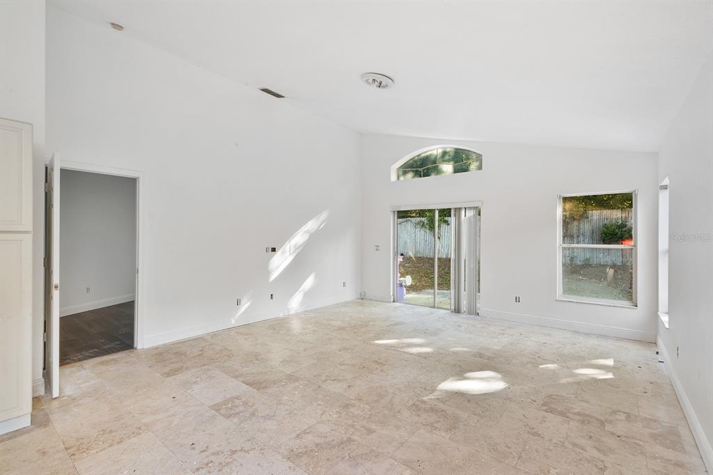 608 Bridge Creek Boulevard Ocoee, FL 34761 - Photo 5 of 17 a view of an empty room with window