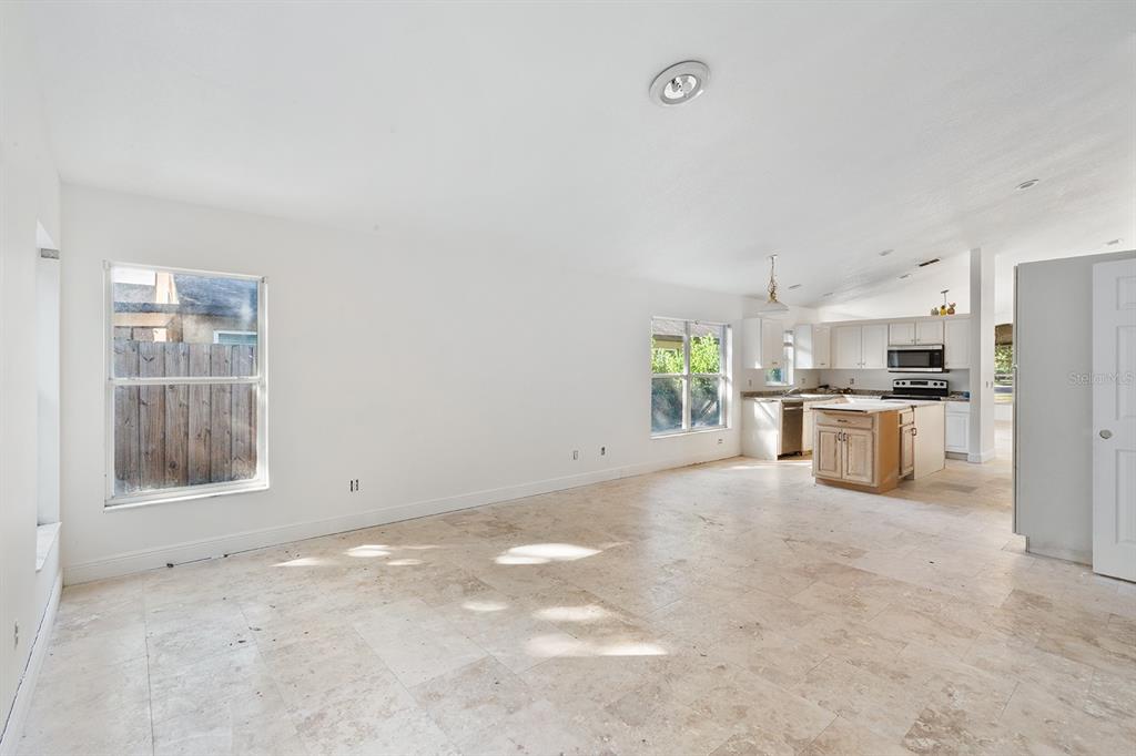608 Bridge Creek Boulevard Ocoee, FL 34761 - Photo 7 of 17 a view of a kitchen with a sink and a window