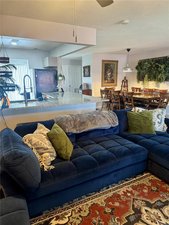 2379 Flamingo Way Winter Park, FL 32792 - Photo 12 of 25 a living room with furniture and a couch
