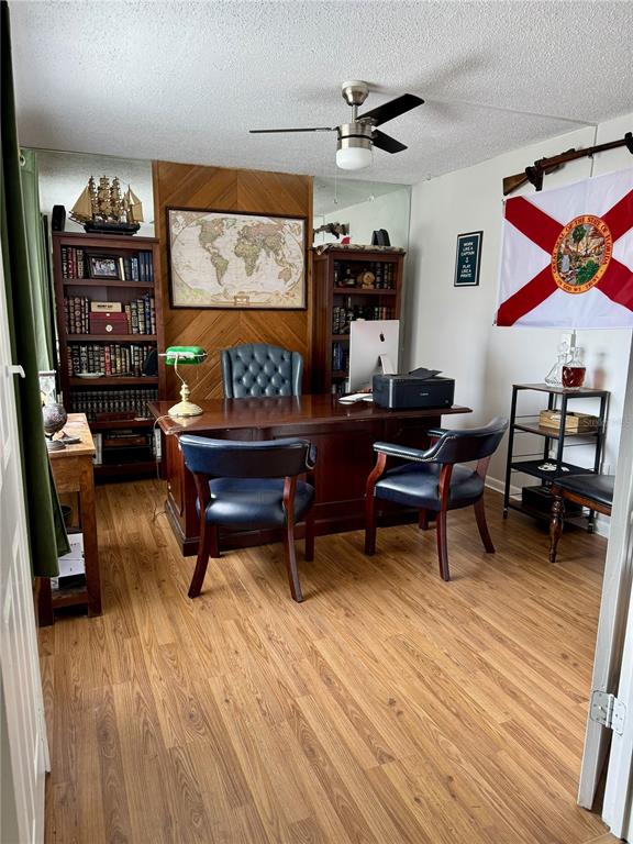 2379 Flamingo Way Winter Park, FL 32792 - Photo 2 of 25 a living room with furniture a rug and a large window