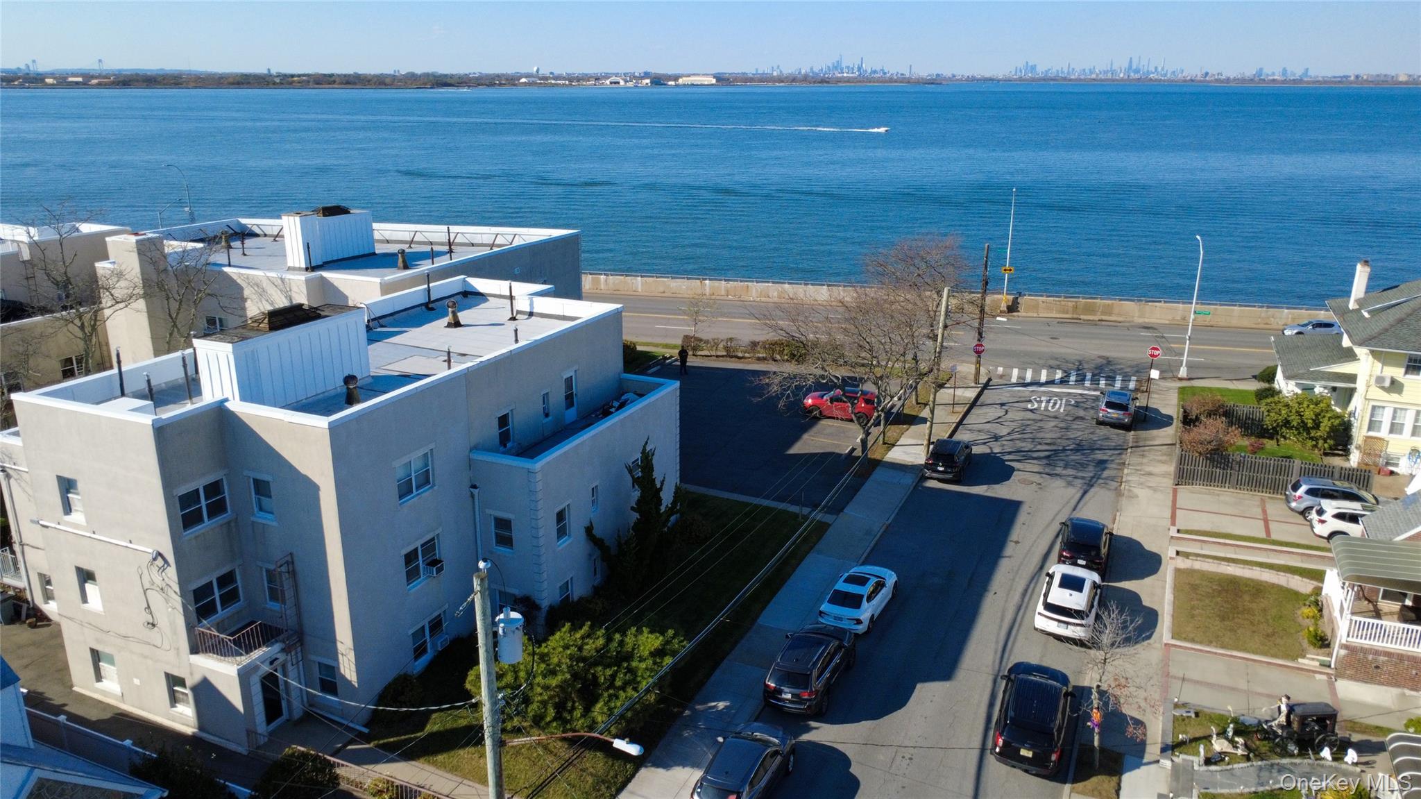 525 Beach 138th Street, Unit A2 Queens, NY 11694 - Photo 11 of 12 an aerial view of a houses with outdoor space