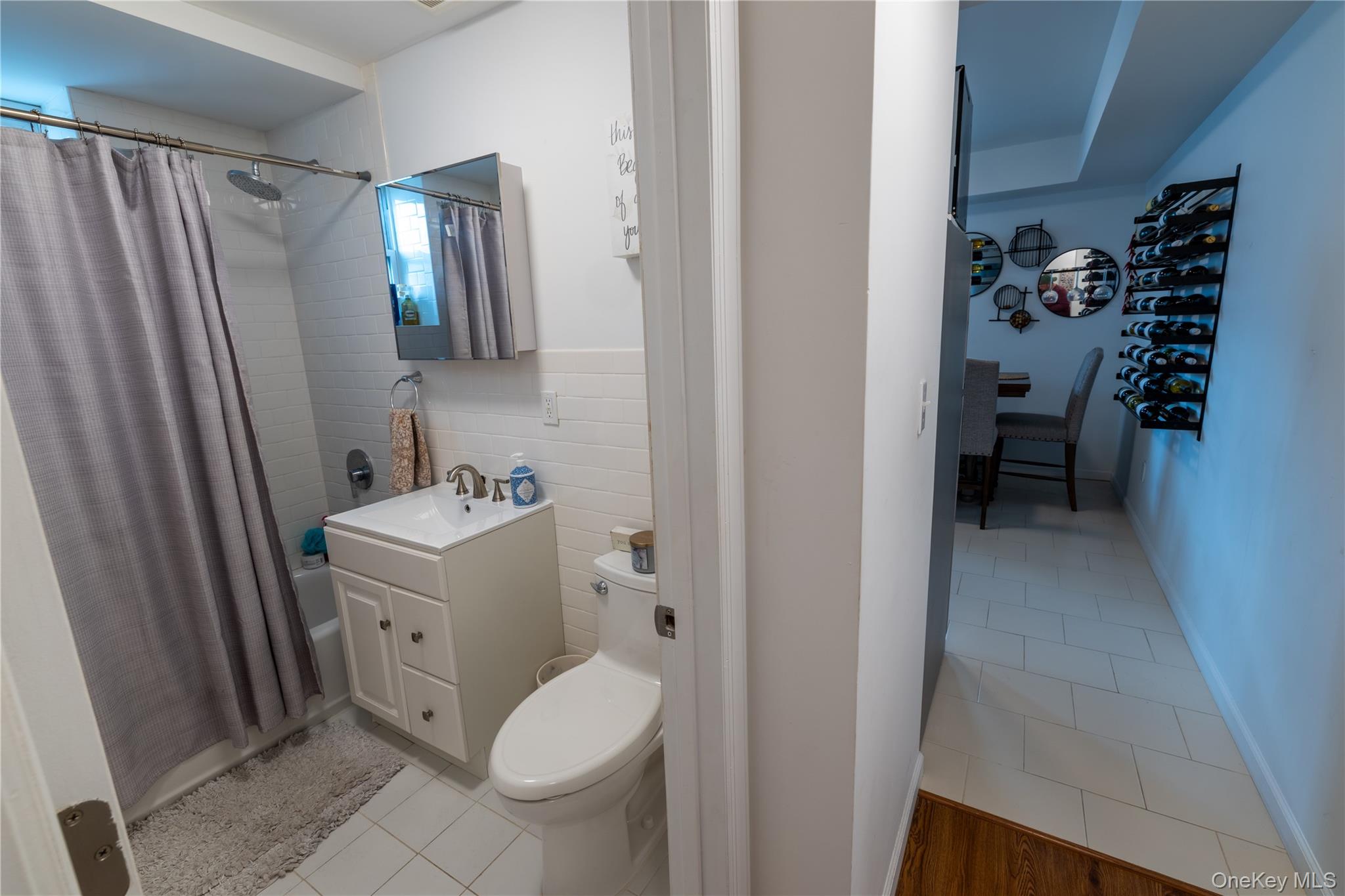 525 Beach 138th Street, Unit A2 Queens, NY 11694 - Photo 9 of 12 a bathroom with a sink toilet and shower