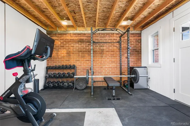 a view of gym equipment with windows