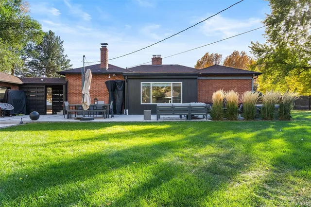 a front view of house with yard and seating area