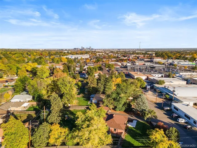 an aerial view of residential building and trees