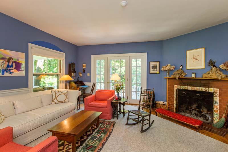 85 Foreside Road Cumberland, ME 04110 - Photo 8 of 35 Cozy fireplace with tile surround...