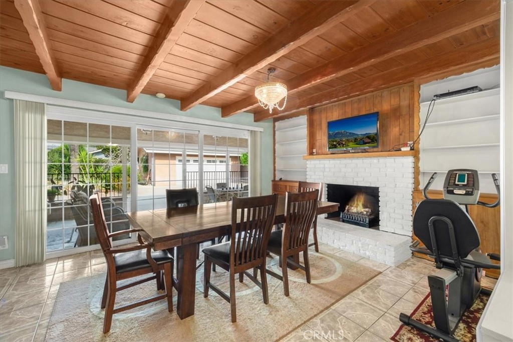 2183 Sinclair Street Pomona, CA 91767 - Photo 21 of 38 a view of a dining room with furniture window and outside view