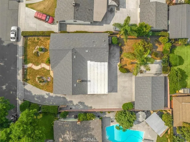 an aerial view of residential building with parking space