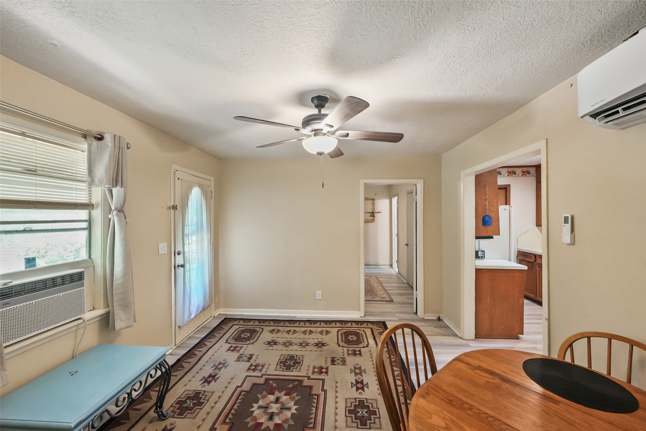 6387 Oak Knoll Road Montgomery, TX 77316 - Photo 8 of 30 a bedroom with a bed and a chandelier