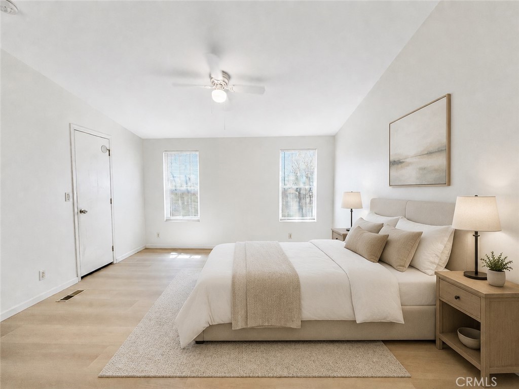 3067 Carl Street Riverside, CA 92507 - Photo 20 of 23 Master Bedroom: Virtually staged. Please note that the furniture and decor displayed have been digitally added for visualization purposes only and are not included in the sale.