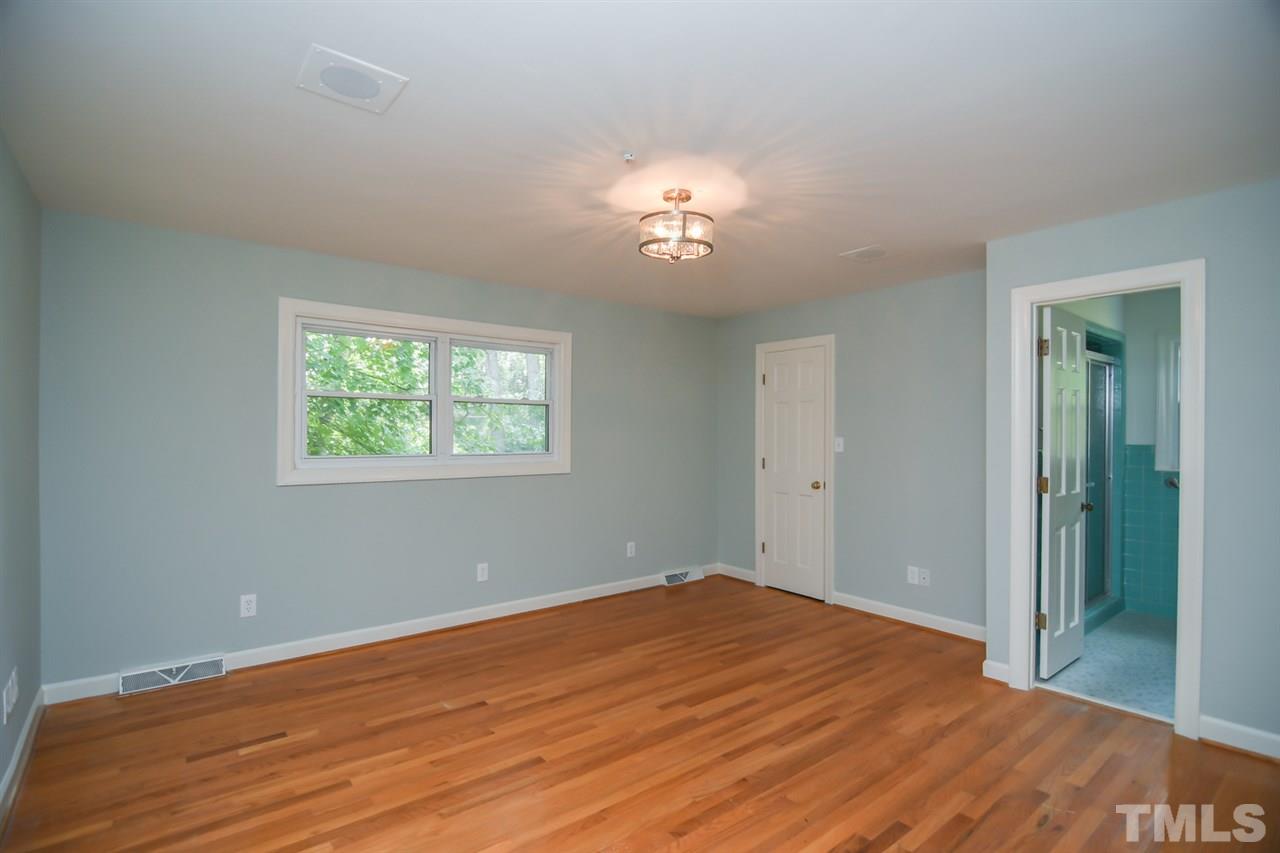 409 May Court Raleigh, NC 27609 - Photo 14 of 25 a view of empty room with wooden floor