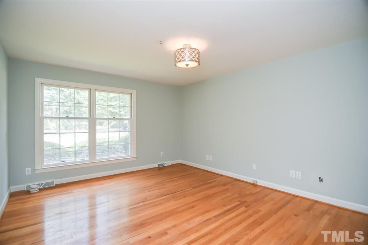 409 May Court Raleigh, NC 27609 - Photo 17 of 25 an empty room with a window