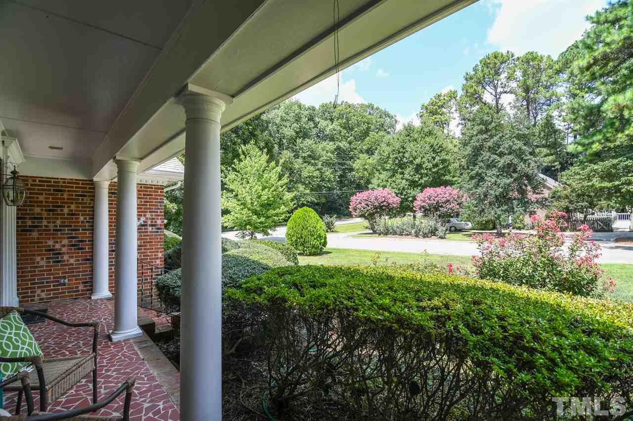409 May Court Raleigh, NC 27609 - Photo 4 of 25 a view of a back yard from a balcony