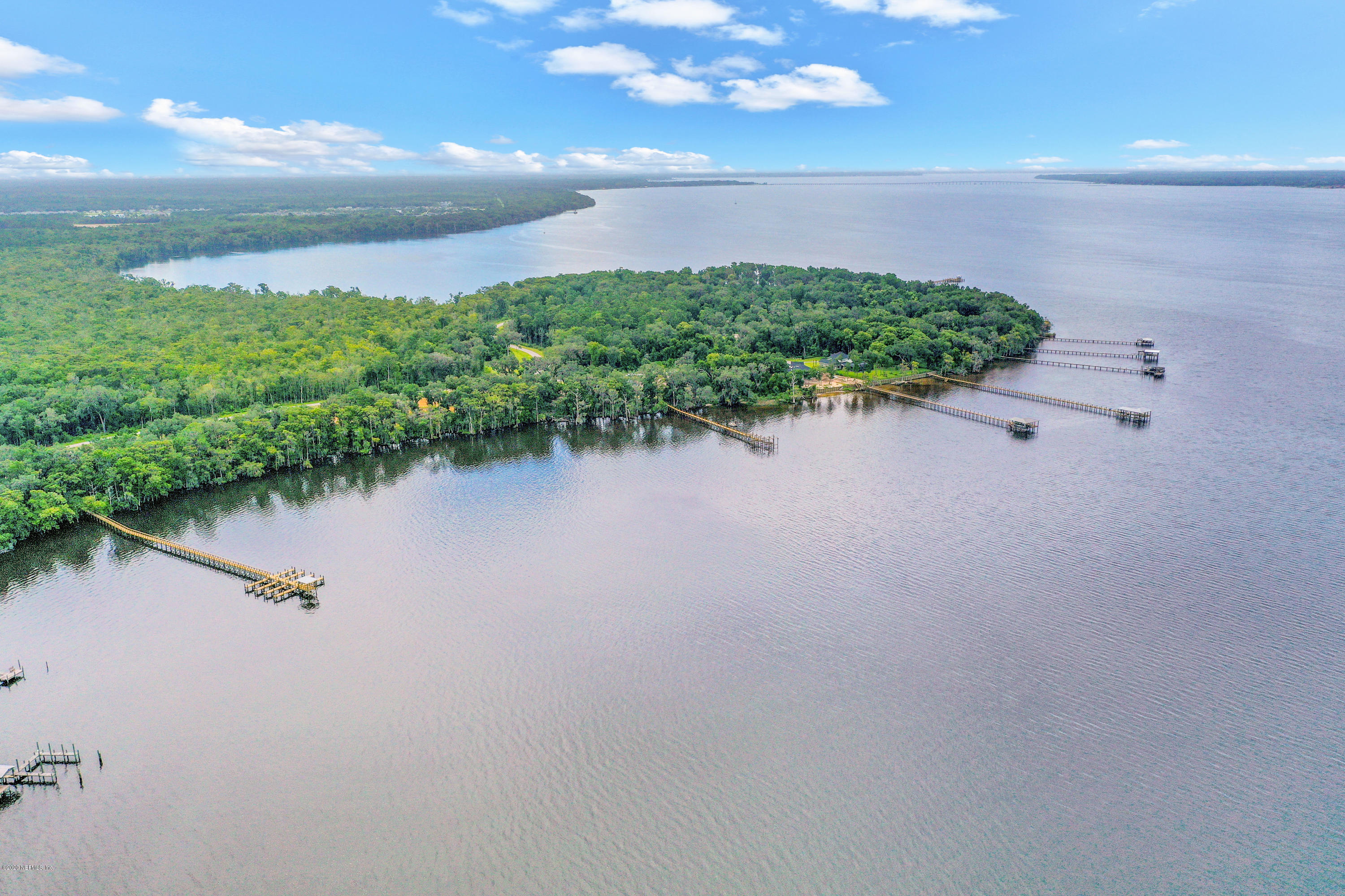 302 Hallowes Cove St. Johns, FL 32259 - Photo 6 of 14 a view of a lake with a city