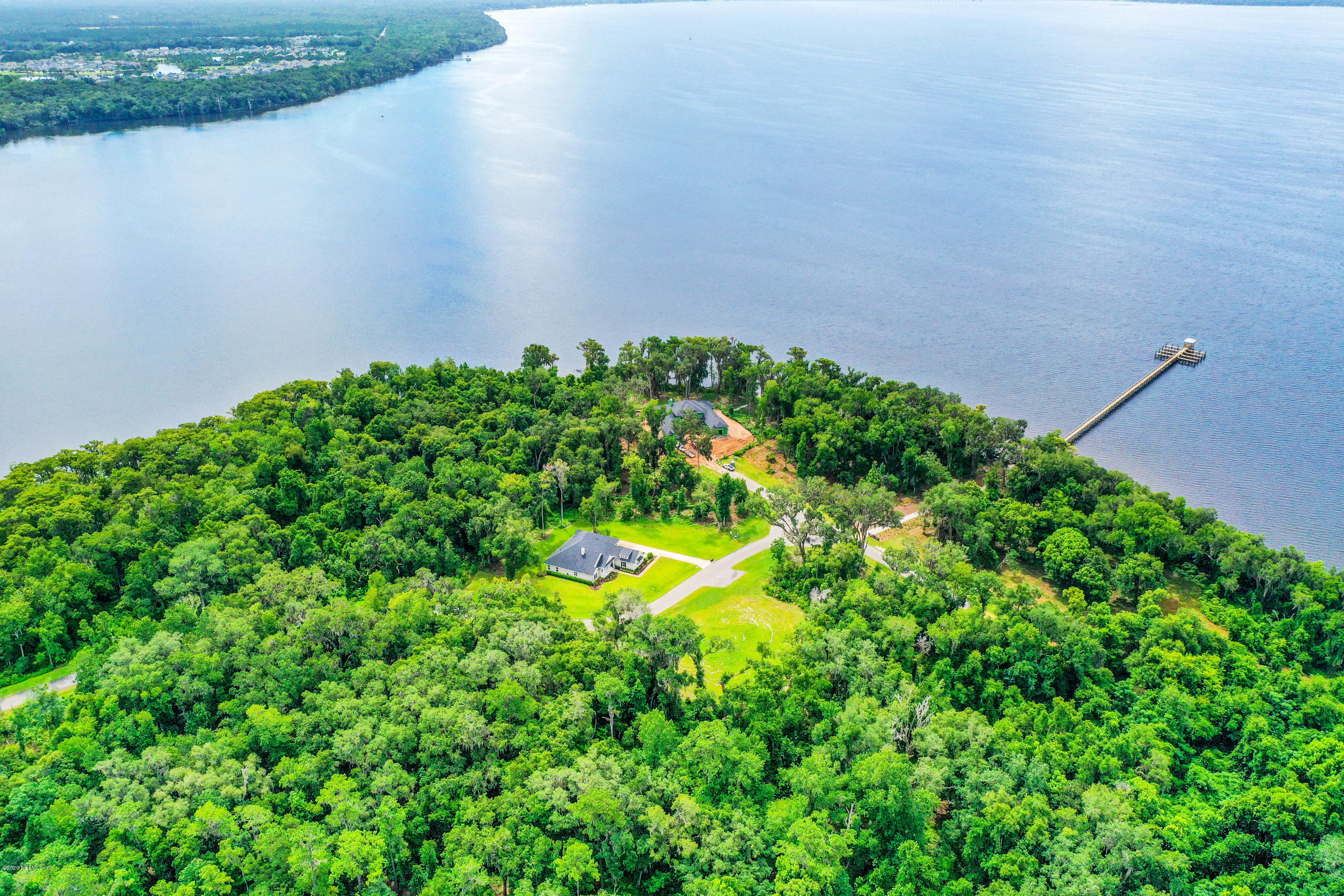 302 Hallowes Cove St. Johns, FL 32259 - Photo 9 of 14 a view of a garden with a lake