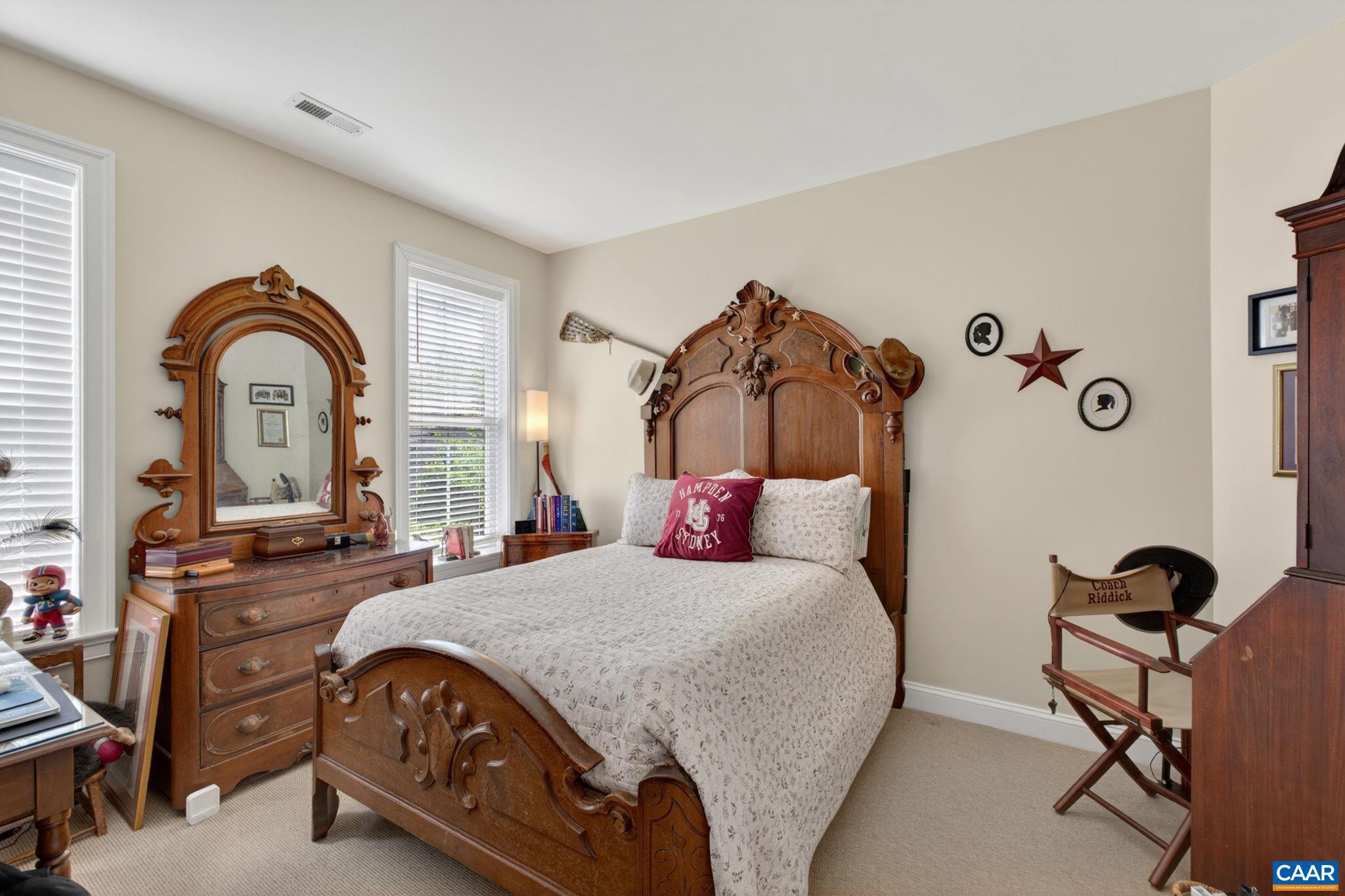 1338 Gate Post Lane Charlottesville, VA 22901 - Photo 32 of 50 a bedroom with a bed and a dresser