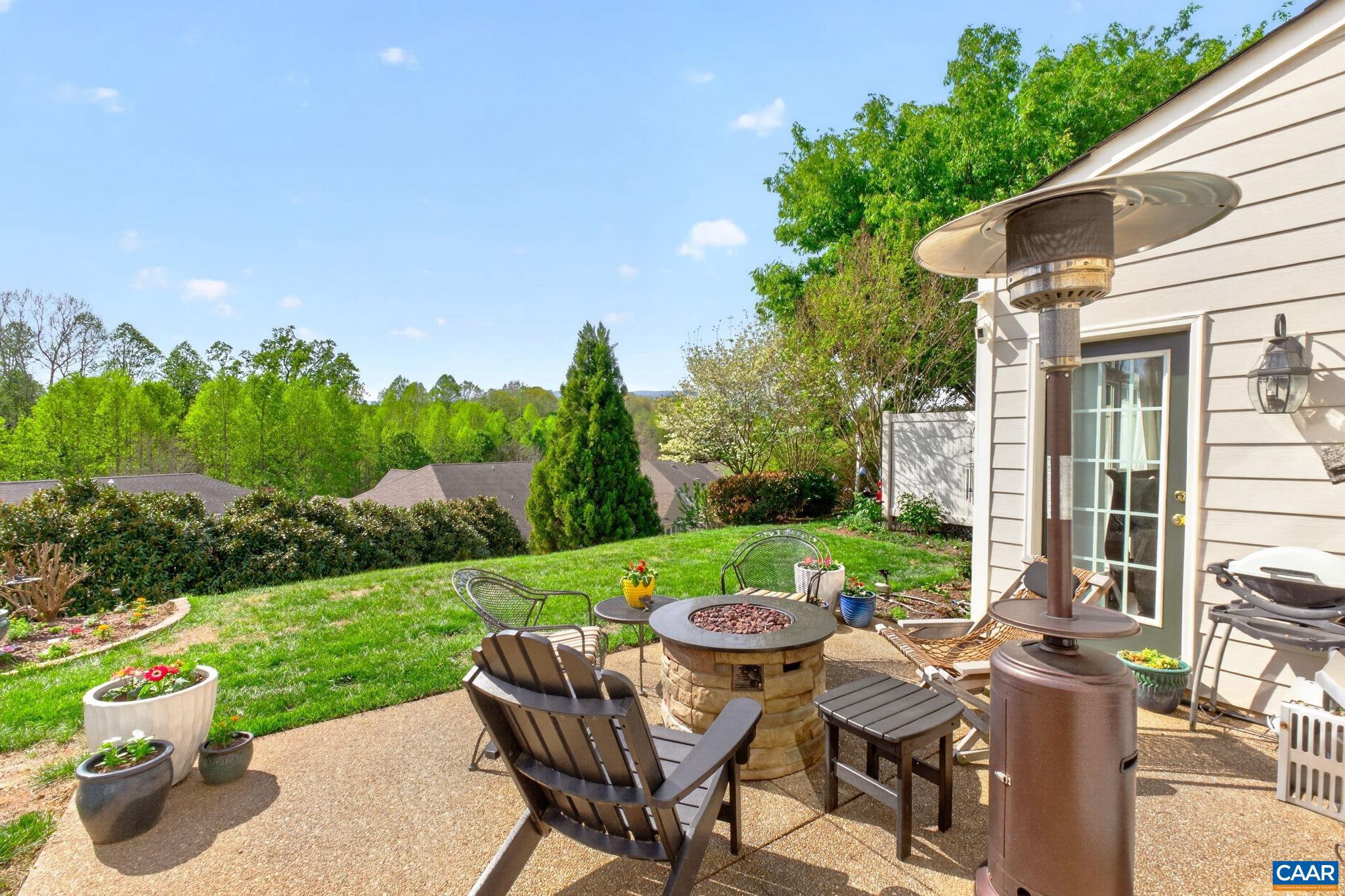 1338 Gate Post Lane Charlottesville, VA 22901 - Photo 40 of 50 a view of a patio with furniture and a yard