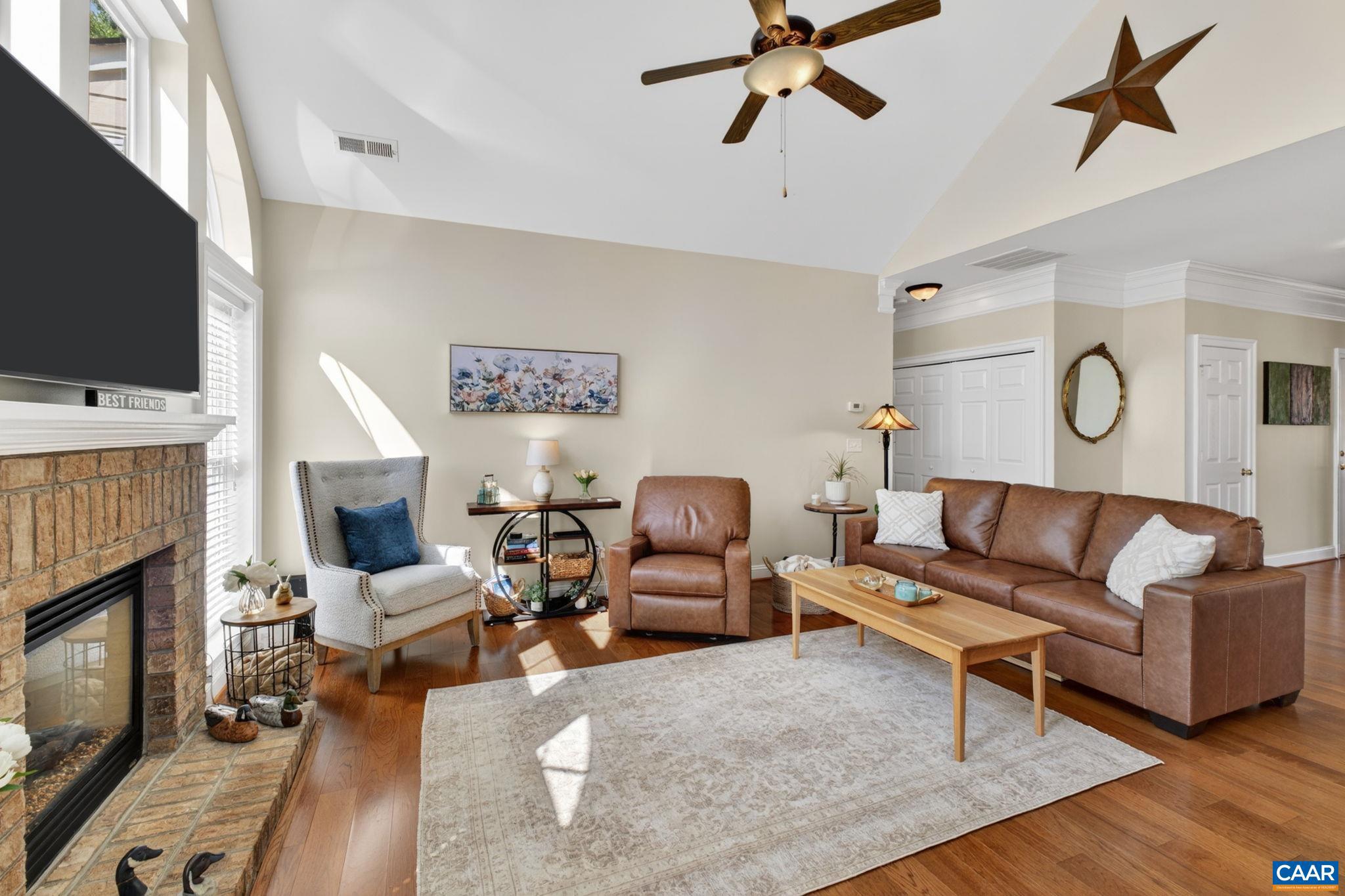 1338 Gate Post Lane Charlottesville, VA 22901 - Photo 10 of 50 a living room with furniture and a fireplace