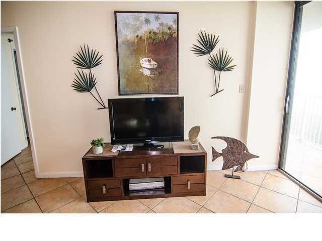 3768 Hwy Santa Rosa Beach, Unit 501 30A Santa Rosa Beach, FL 32459 - Photo 9 of 20 a living room with furniture and a flat screen tv