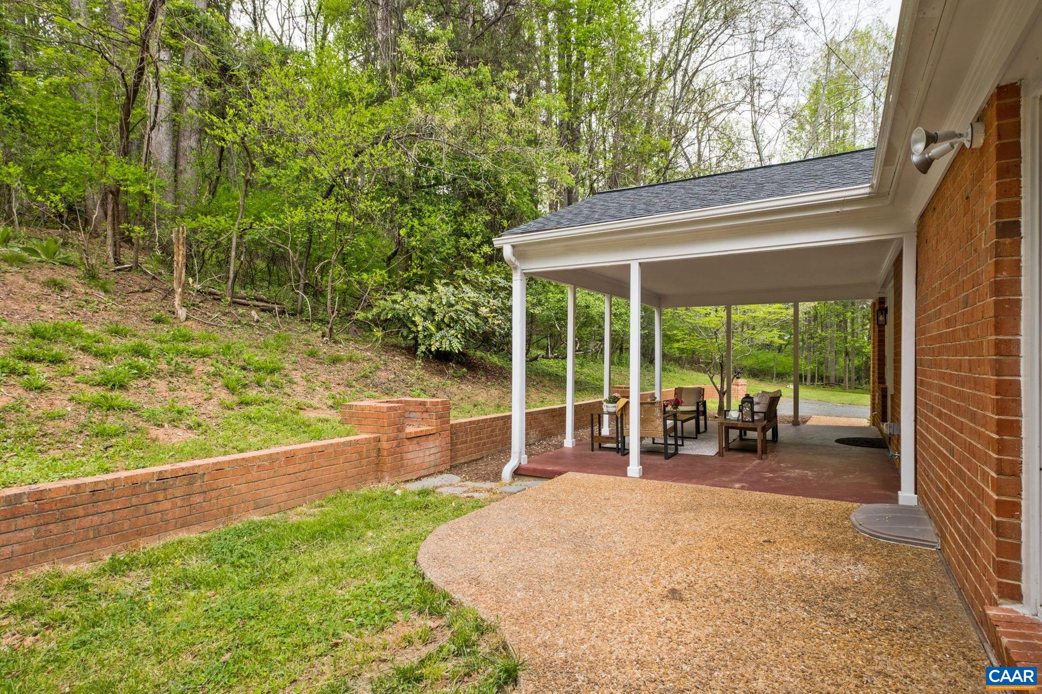 1680 Craigs Store Road Afton, VA 22920 - Photo 18 of 57 a view of a backyard with plants and a backyard