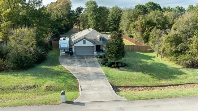 a view of a garden with a fountain