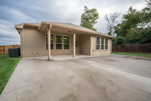 front view of a house with a small yard