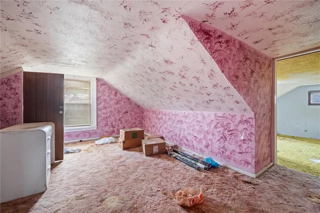 a view of a livingroom with a staircase