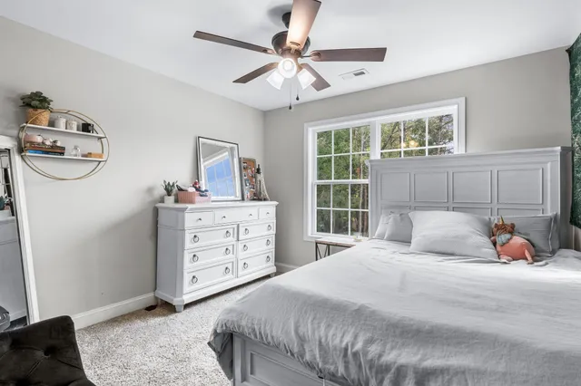 a view of a swimming pool with a sitting space