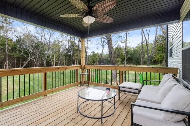 a view of a park with large trees