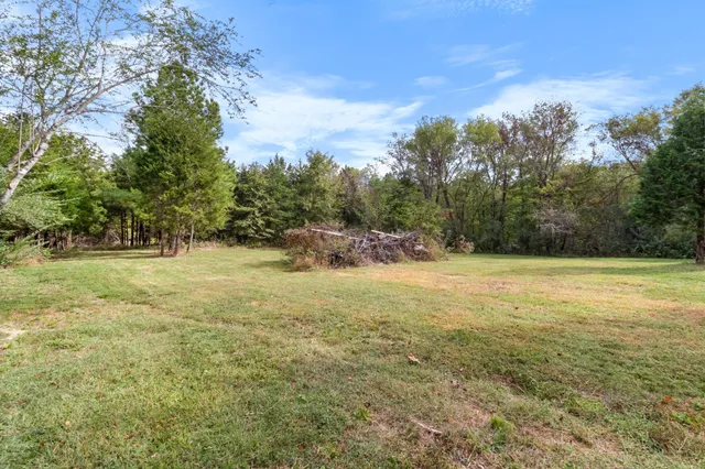 a house view with a garden space