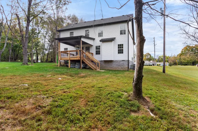 a view of a yard with an outdoor space